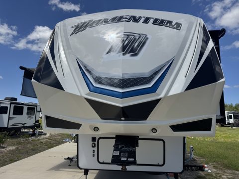 Grand Design Momentum toy hauler front cap finished with a marine-grade ceramic coating under a clear Oklahoma sky