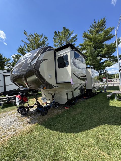 Fifth wheel front cap and sidewall gleaming after gelcoat restoration at an Oklahoma campground